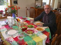 dad enjoying a lunch of pasta and vegtables