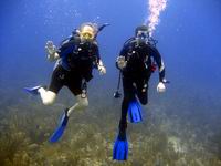 Michael and Matthew scuba diving in Belize